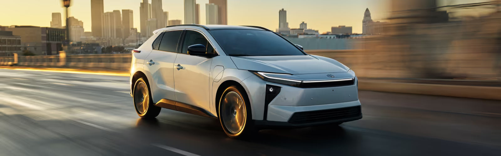 2026 Toyota bZ driving on the road.