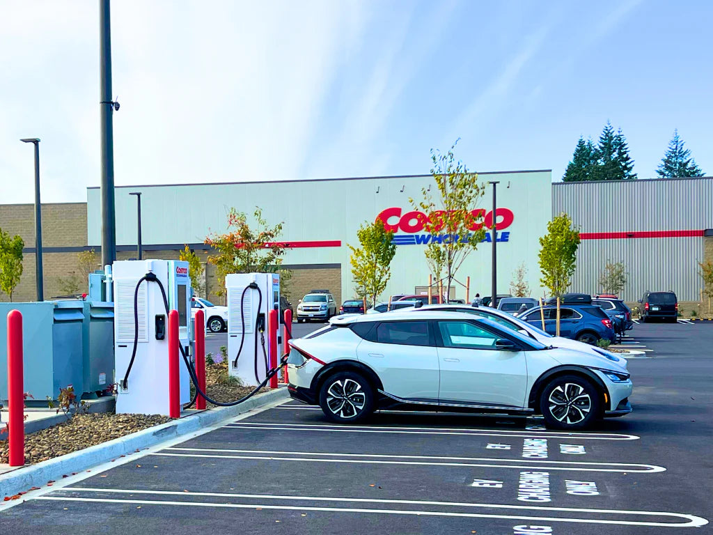 Couple of EVs are being charged by Costco chargers.