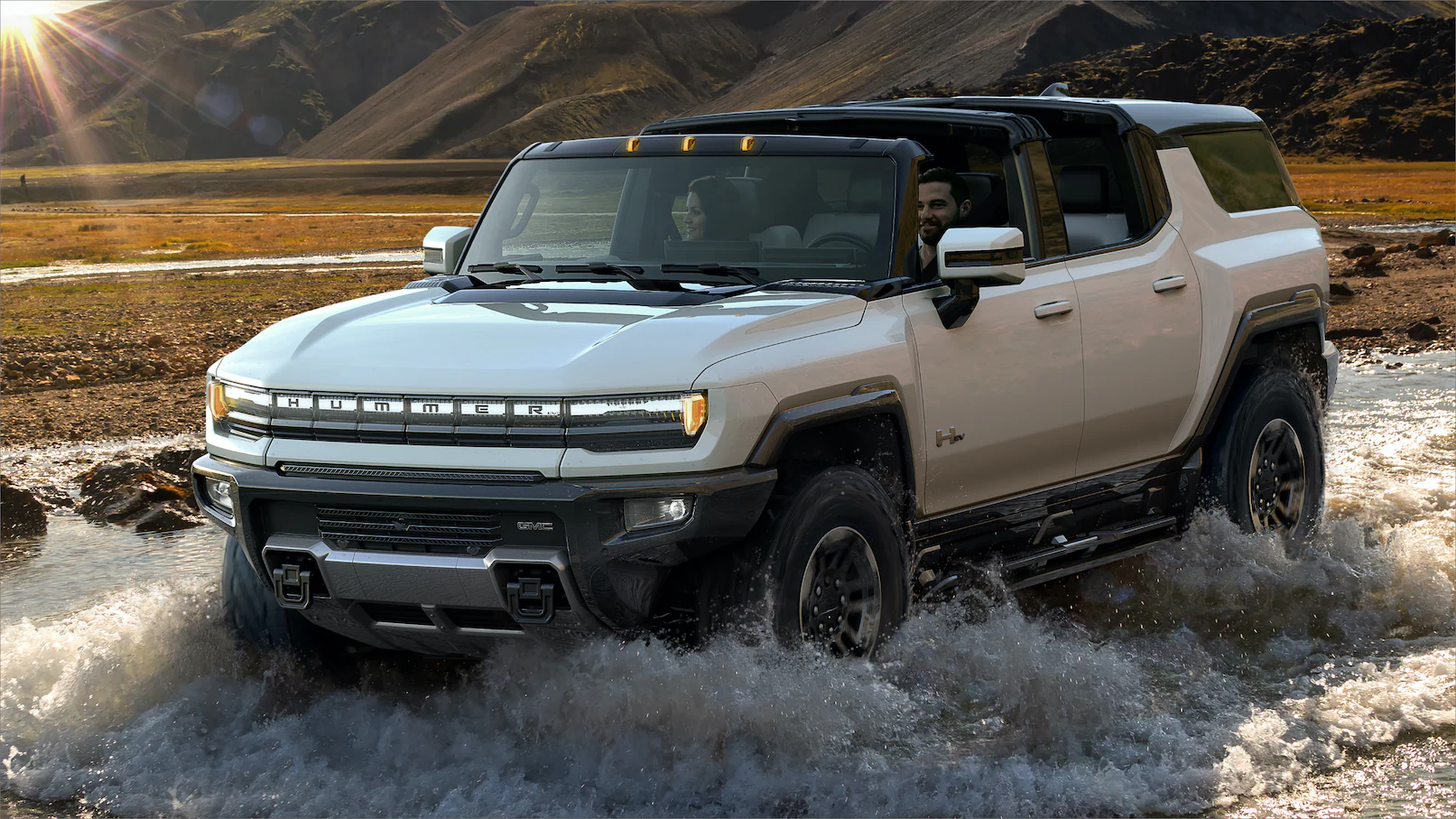 Man driving GMC Hummer EV