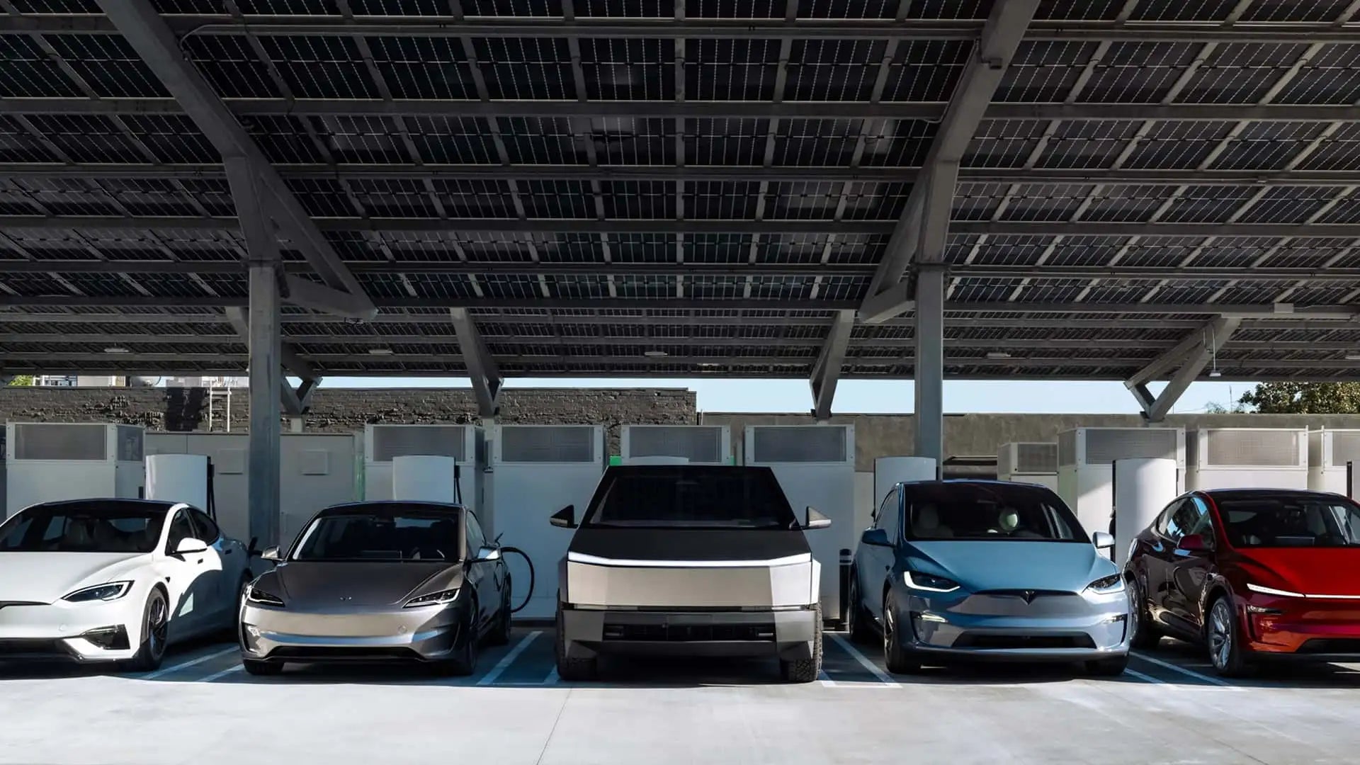 Tesla Models are charging in a line