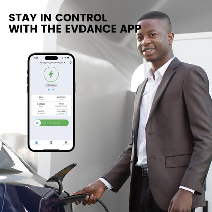 A male is inserting the NACS plug into the Model Y's charging port